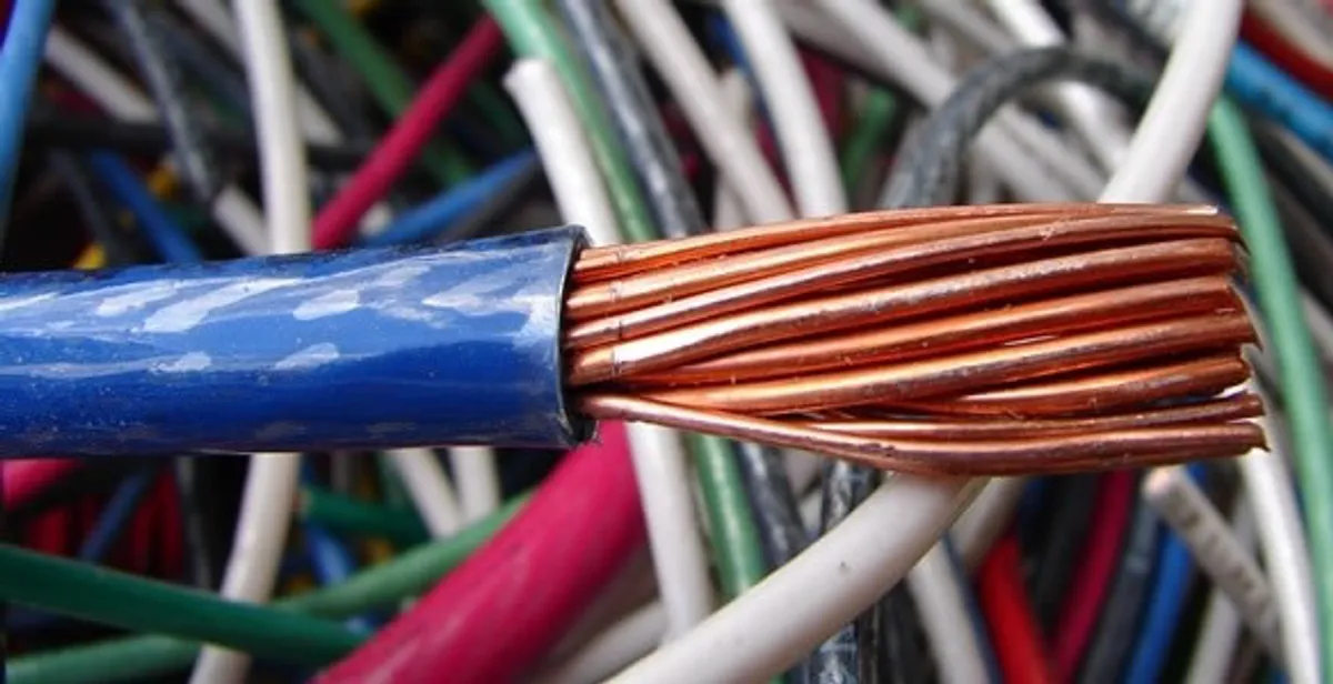 electrical wiring services showing exposed copper conductors and cable preparation in Mesa, AZ
