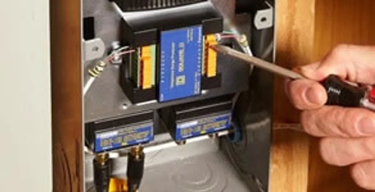 Whole home surge protection device being installed by a licensed electrician to protect electrical systems in Mesa, AZ